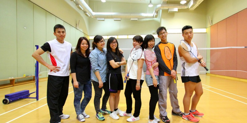 Asian friends playing badminton