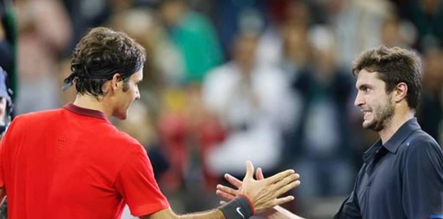 Simon fights valiantly vs Federer